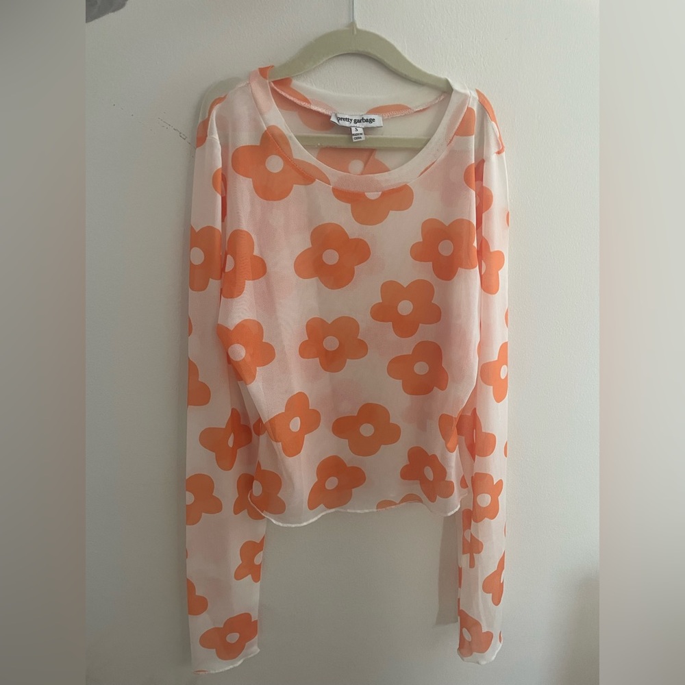 size small mesh orange and white flower long sleeve top.